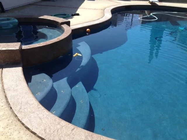 Swimming pool with tiled steps and a freshly plastered interior surface